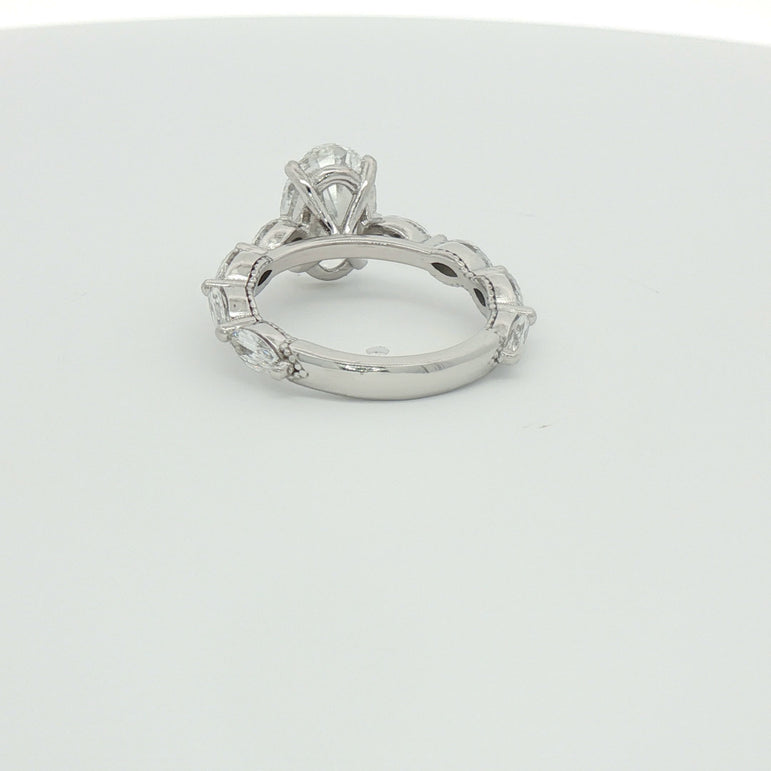 White Gold Multistone Ring with Oval Cut Diamond
