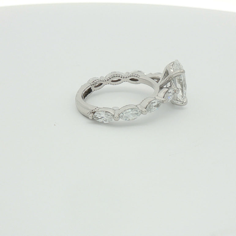 White Gold Multistone Ring with Oval Cut Diamond