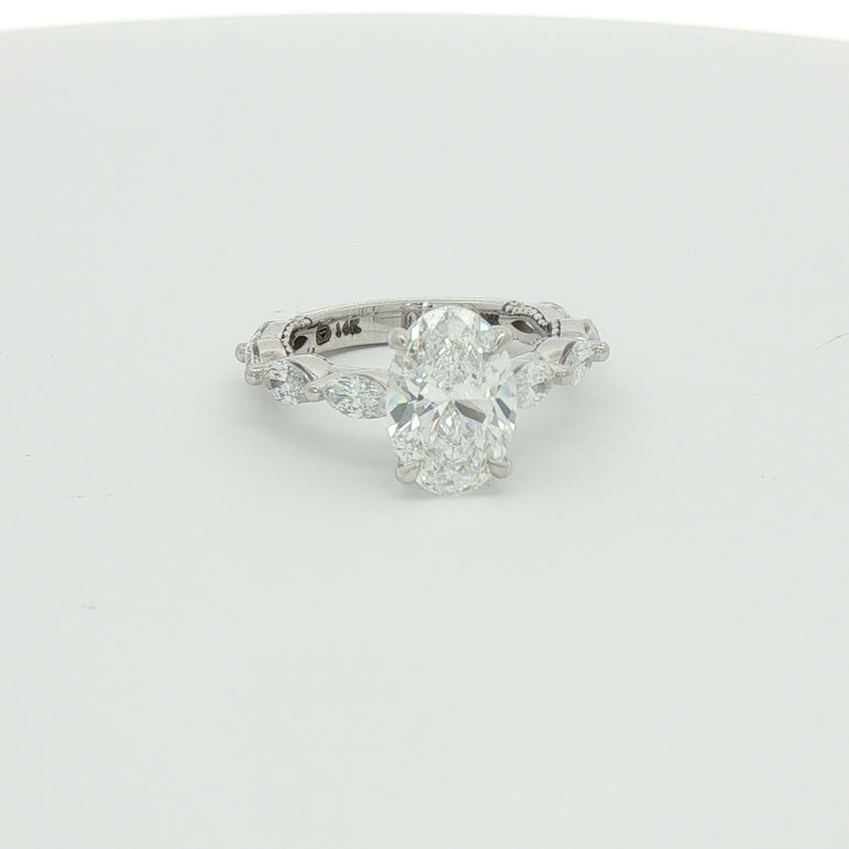 White Gold Multistone Ring with Oval Cut Diamond
