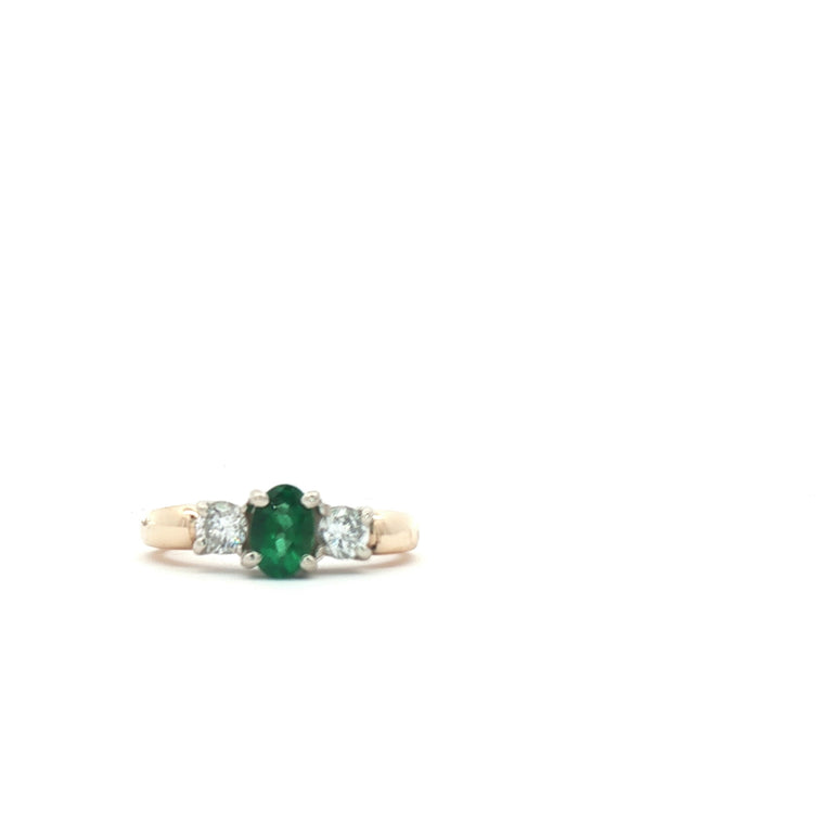 14kt Yellow Gold Ring with Oval 1/4ct Emerald plus natural diamonds