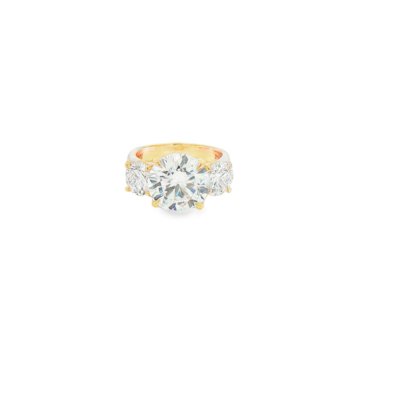 Round Brilliant Diamond Three-Stone Engagement Ring in Yellow Gold