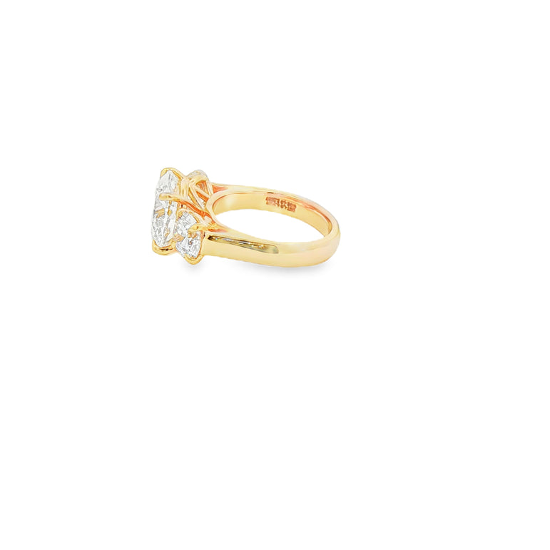 Round Brilliant Diamond Three-Stone Engagement Ring in Yellow Gold