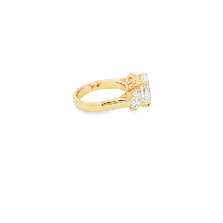 Round Brilliant Diamond Three-Stone Engagement Ring in Yellow Gold