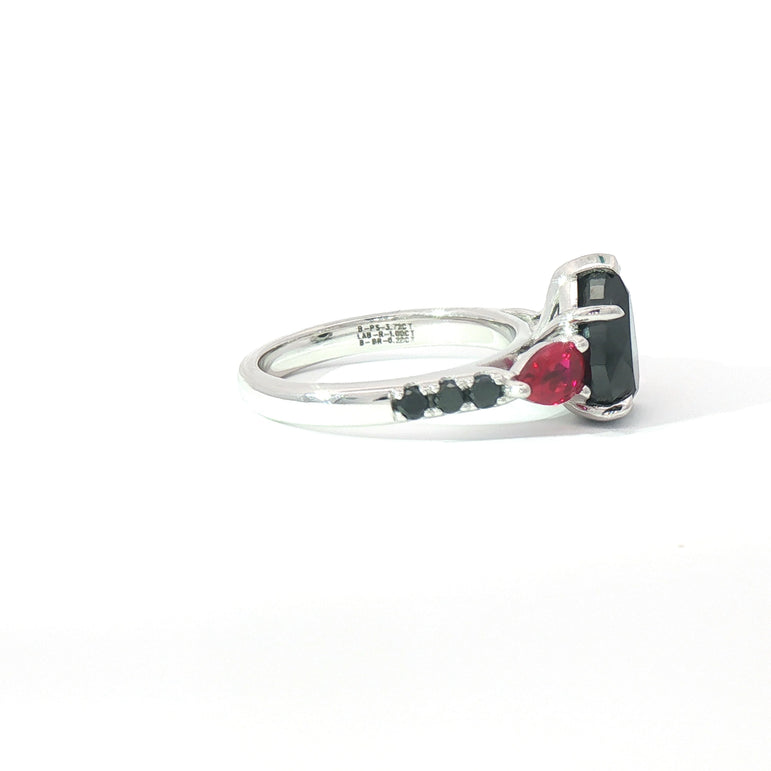 Black pear shaped diamond with pear ruby's