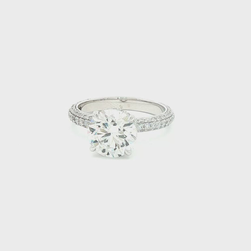 Platinum Multistone Ring with Round Cut Diamond
