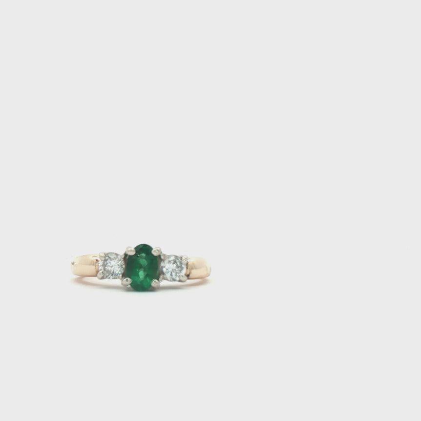 14kt Yellow Gold  Ring with Oval  1/4ct Emerald plus natural diamonds